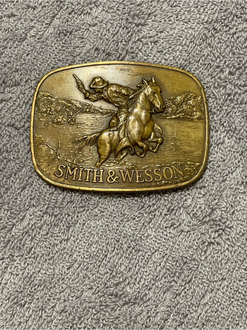 Vintage 1975 Smith & Wesson "The Hostiles' Brass Belt Buckle